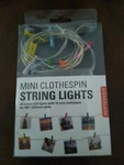 Kikkerland Mini Clothspin String Lights, 20 Warm Ledlights W/ 10 Clothespin. Fixed Price $24.70.