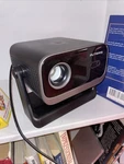 Putrims Mini Projector 1080P Wifi Bluetooth Portable Phone Hdmi Usb Auto Focus. Fixed Price $65.00.