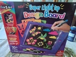 Cra-z-art Super Light Glow Design Board + Neon Mini Markers & Stencils, New. Fixed Price $34.00.