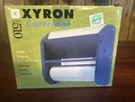 Xyron Model 510 Drop-in Replacement Cartridge At 1606-15 Acid-free Perm Adhesive. Fixed Price $19.99.